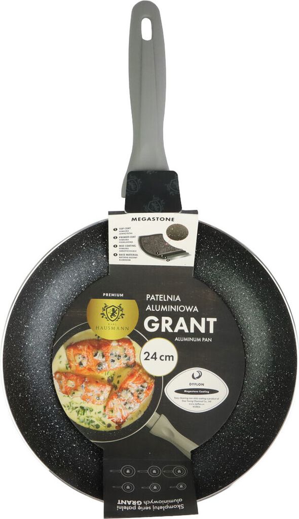 A frying pan with a gray handle and a black speckled surface, displayed against a white background. It has a product label attached to the handle.