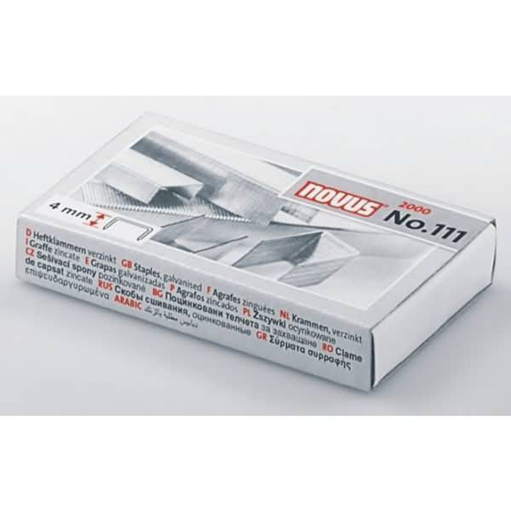 A box of NOVUS staples is shown on a white and light gray background.