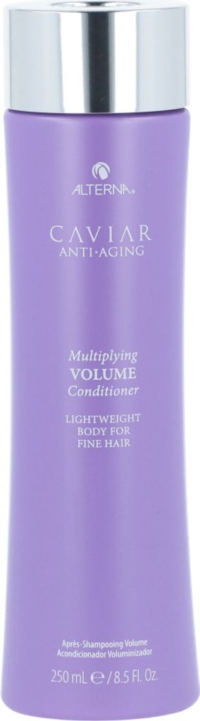 A product shot of a purple bottle of Alterna Caviar Multiplying Volume Conditioner against a white background.