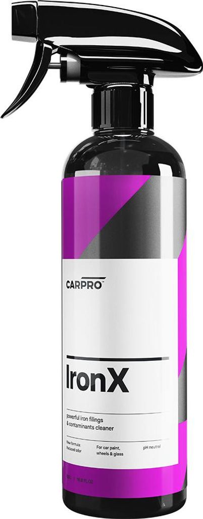 A bottle of CarPro IronX cleaner with a spray nozzle.