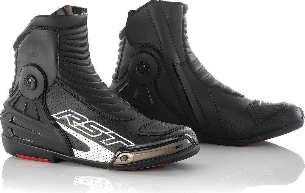 A pair of black motorcycle boots are shown against a white background.