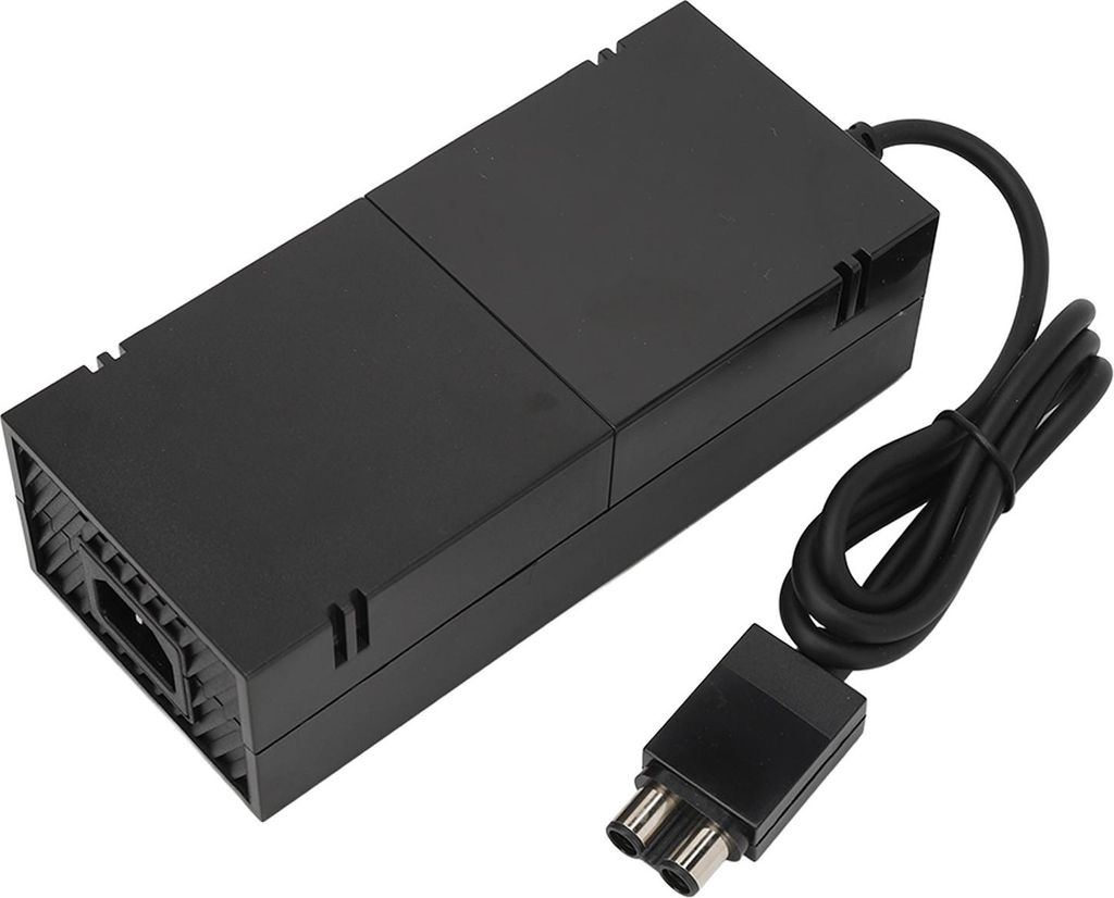 A black power adapter for an Xbox One console is shown on a white background.