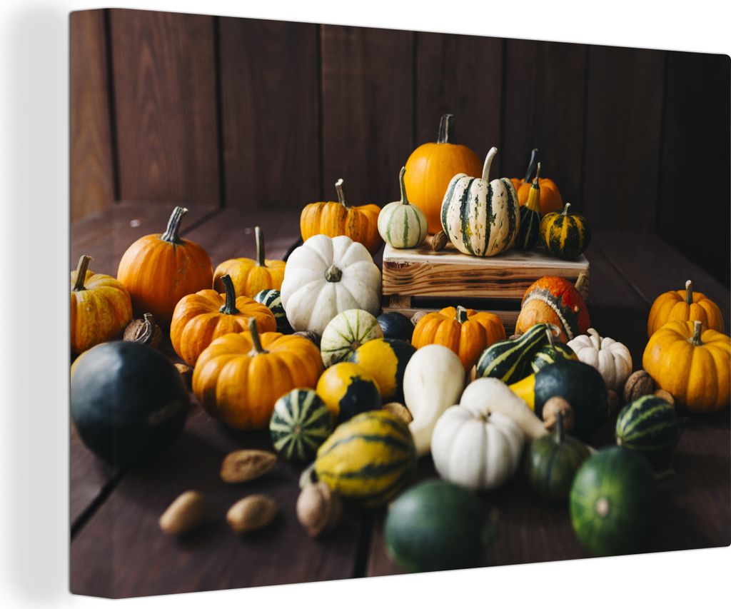 OneMillionCanvasses - Leinwandbilder - 140x90 cm, Eine große Sammlung von Kürbissen auf einem Holzsockel, Wandbilder Kunstdruck Wanddekoration