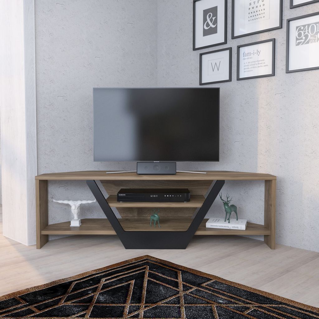 A corner TV stand with a TV and various decorative items.