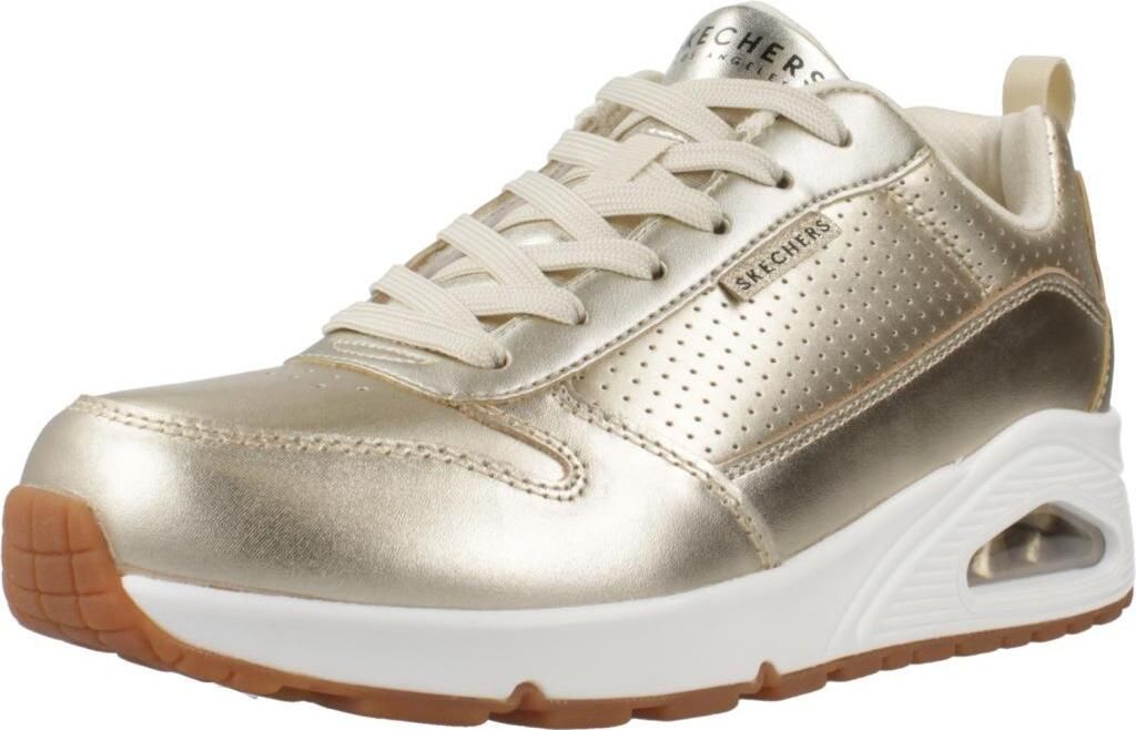 A single gold SKECHERS UNO-METALLIXS sneaker is shown from a side-front angle against a white background.