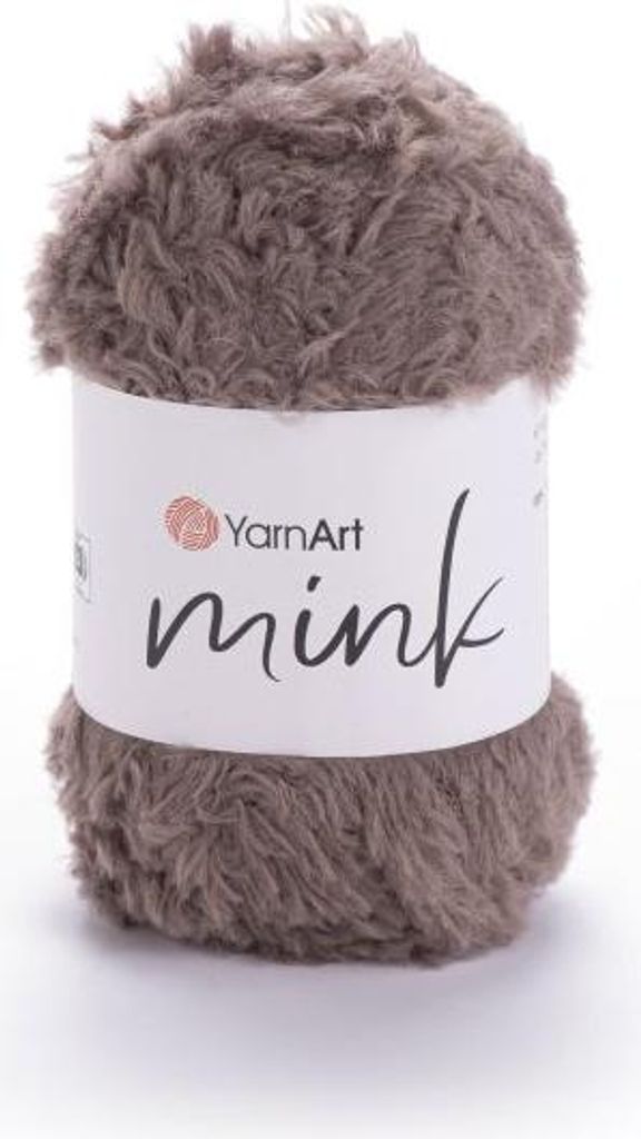 A ball of brown yarn with a label.