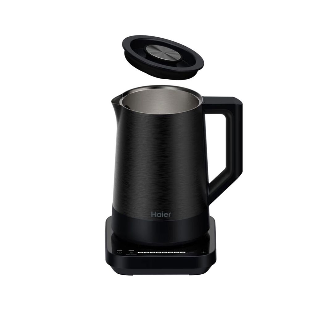 A black electric kettle with its lid slightly ajar, placed on its charging base against a white background.