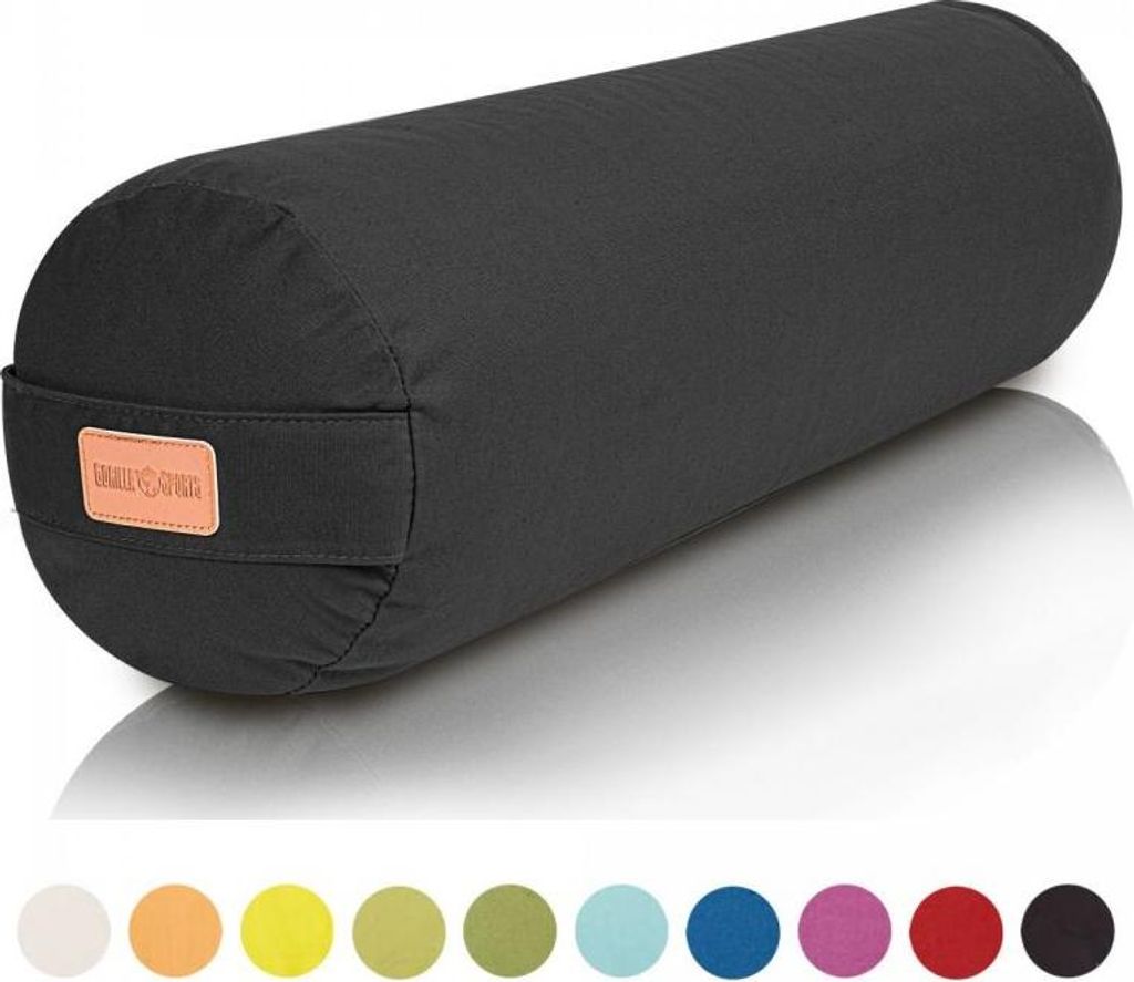 A black yoga bolster is shown on a white background with a reflection.