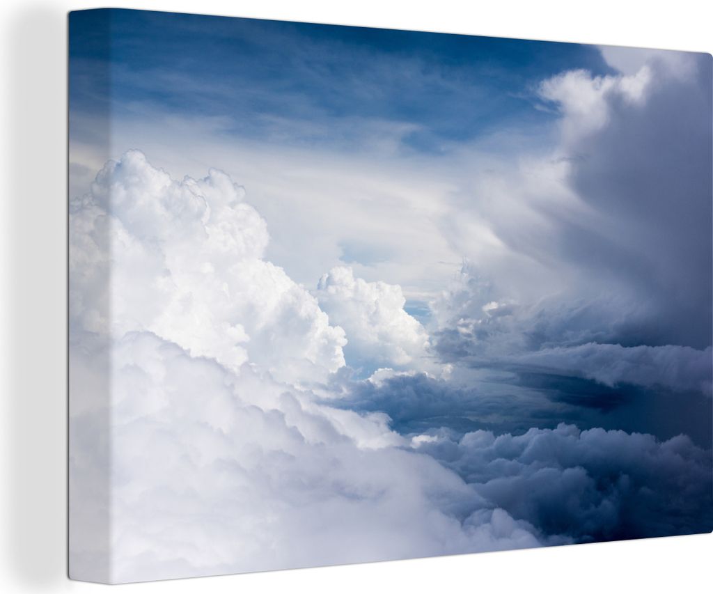 MuchoWow - Leinwandbilder - Große weiße Wolken an einem dunkelblauen Himmel, Wandbild, Wanddeko Bilder Wohnzimmer, 60x40 cm