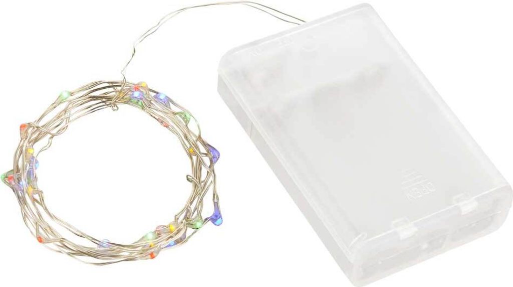 A string of multicolor LED lights coiled next to a clear plastic battery case.