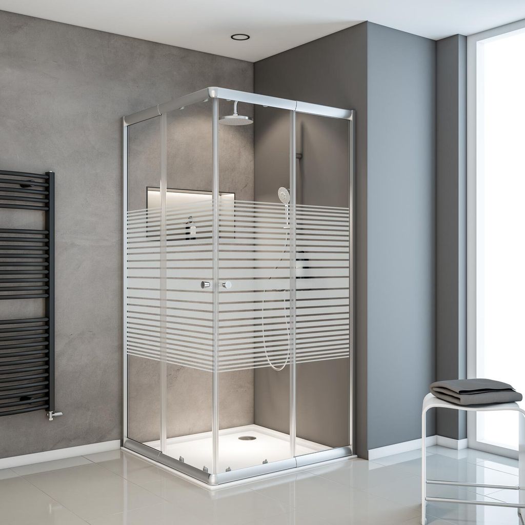 A modern bathroom with a glass shower enclosure.
