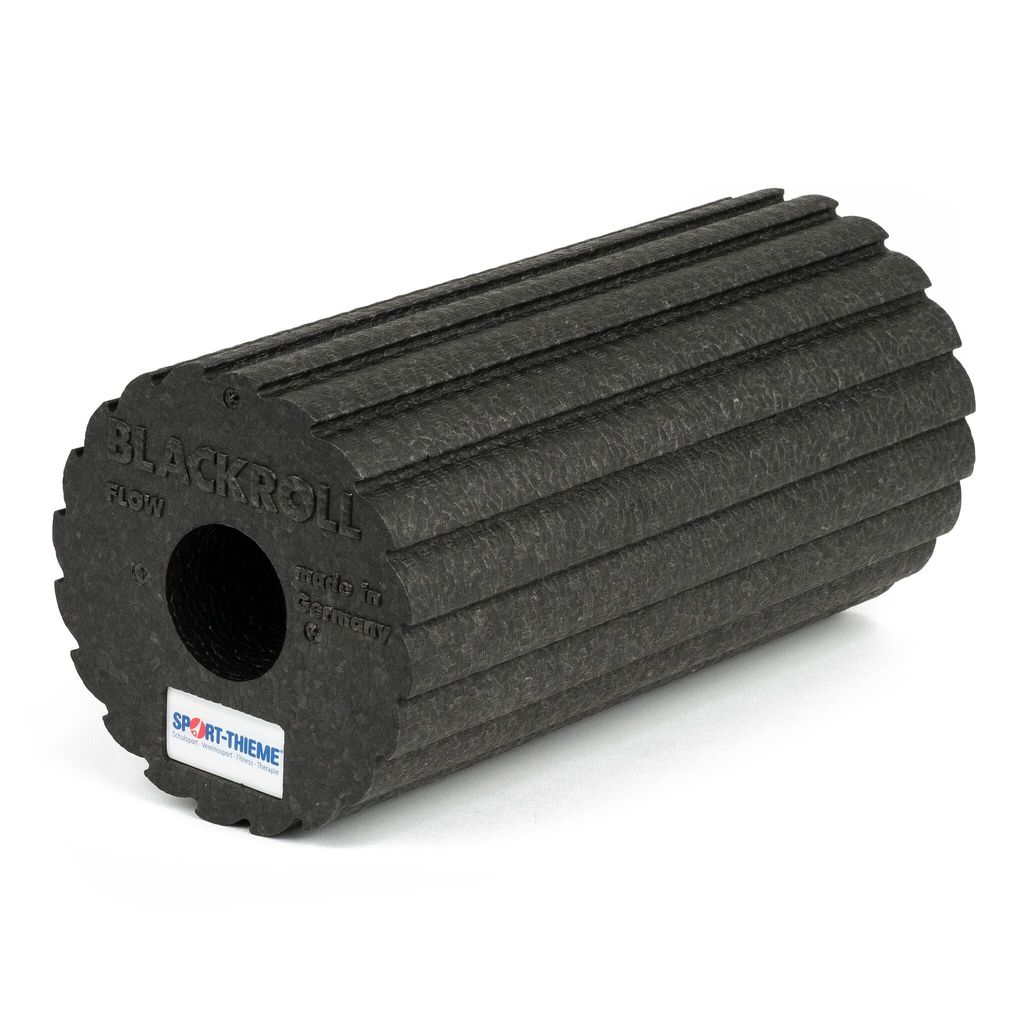 A black foam roller with ridges, shown on a white background.
