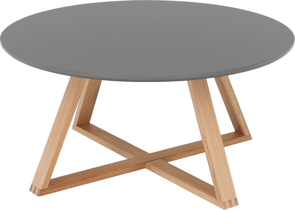 A round coffee table with a gray top and wooden legs.