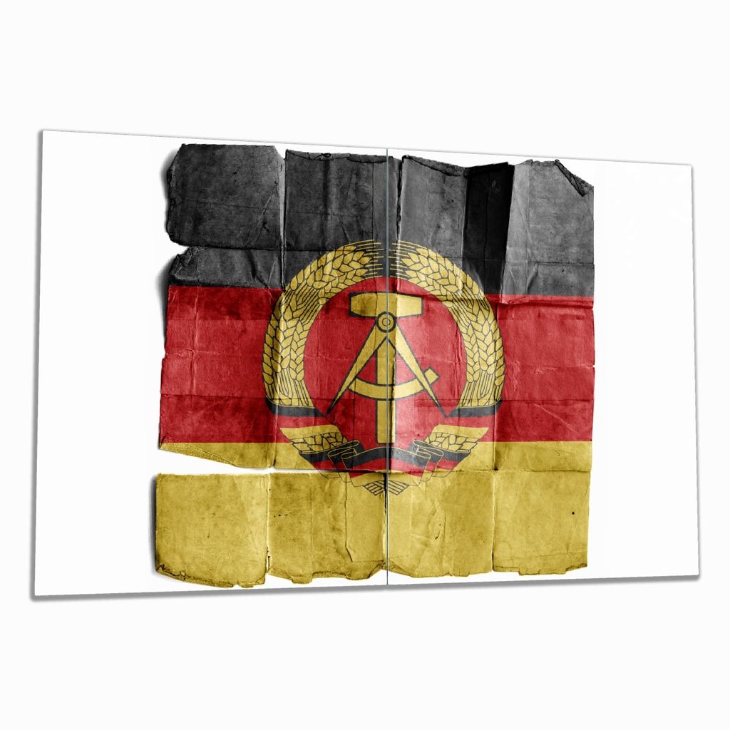 Wallario Herdabdeckplatte aus Glas, Größe 80 x 52 cm 2-teilig, Motiv DDR Flagge auf altem Papier - schwarz rot gold