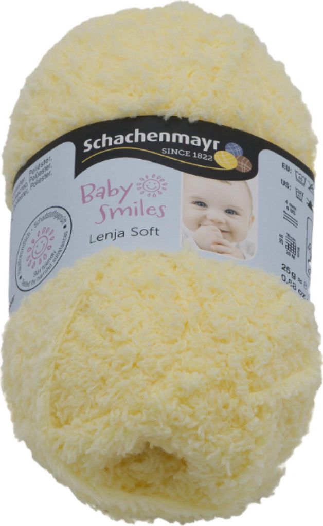 A ball of yellow yarn with a label wrapped around it.