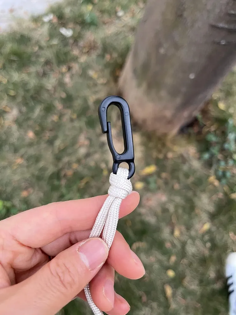 Corde à linge rétractable noire 10m avec 20 pinces pour le camping - 4