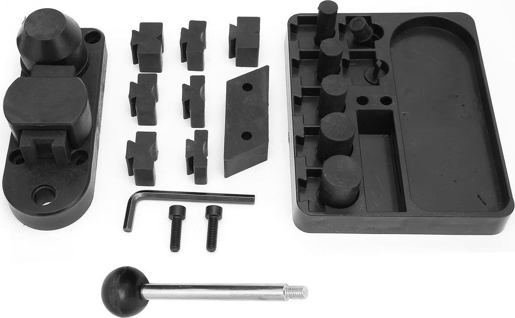 A set of jewelry making tools laid out on a white background.
