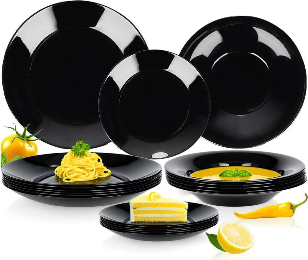 A collection of black dinnerware, including plates and bowls, with food items like spaghetti and cake arranged on some of them.
