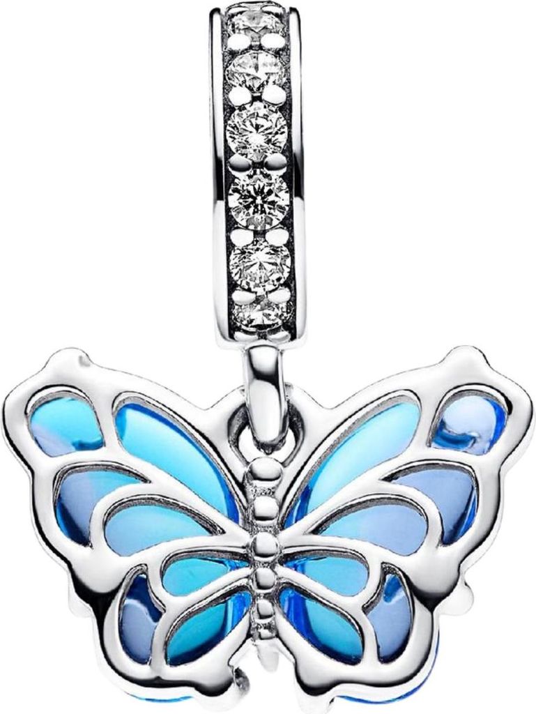 A close-up studio shot of a silver and blue butterfly charm with cubic zirconia stones on the bail.