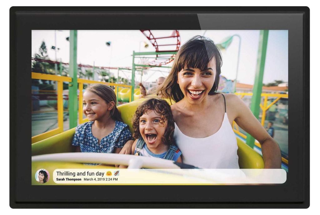 A digital photo frame displaying a family on a roller coaster ride.
