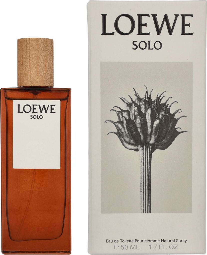 A product shot of a perfume bottle and its packaging.