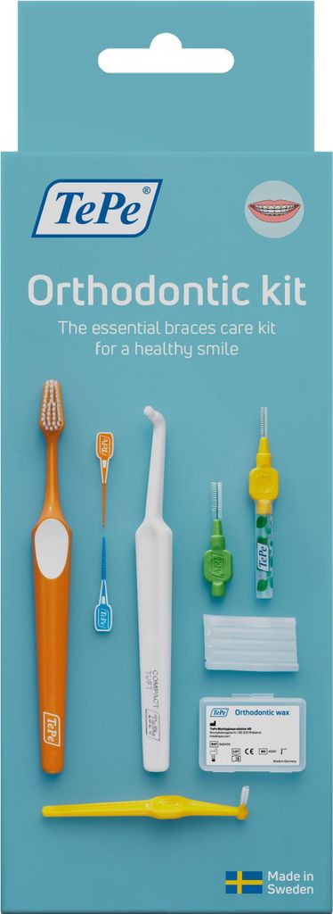 A product shot of an orthodontic care kit on a light blue background.