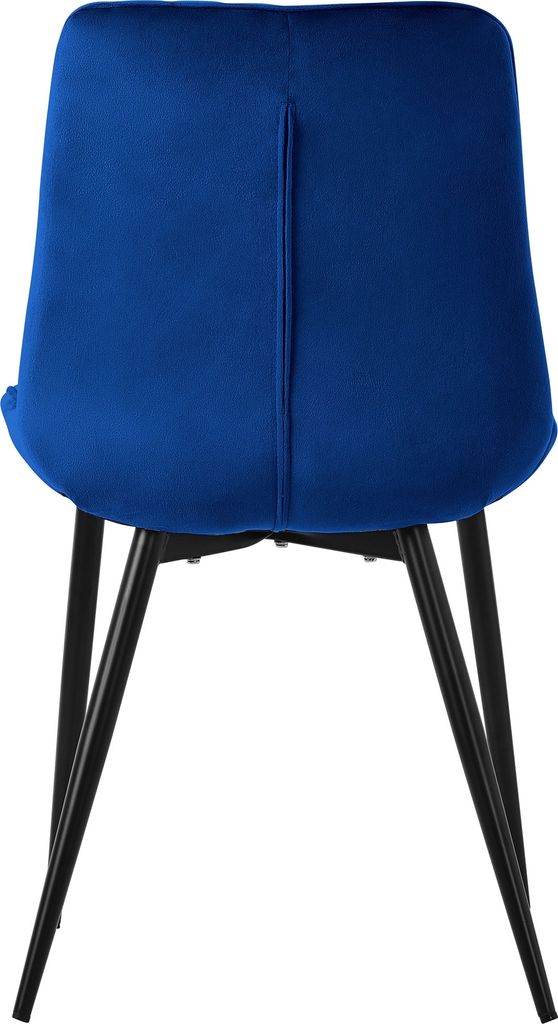 The back view of a dark blue velvet chair with black metal legs.