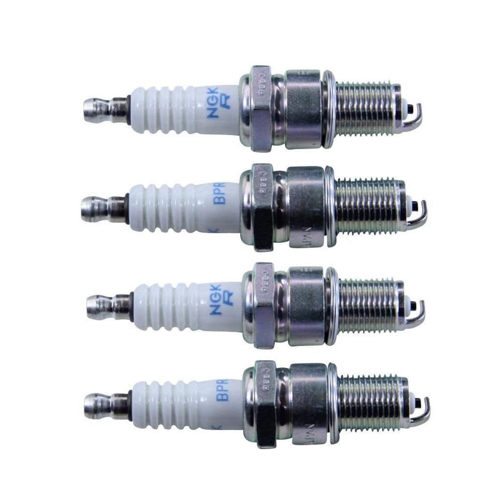 Four spark plugs are arranged vertically against a white background.