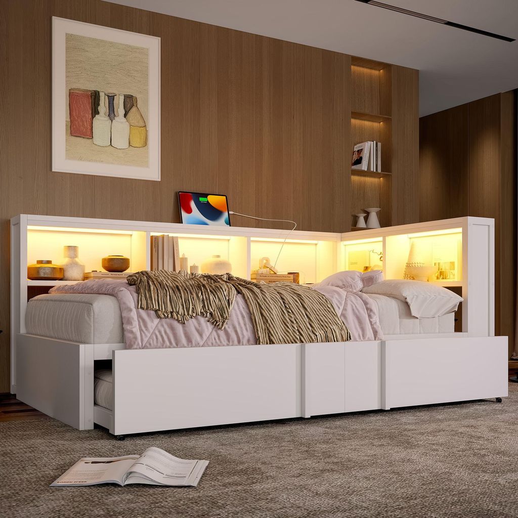 A white daybed with integrated storage and LED lighting in a bedroom setting.