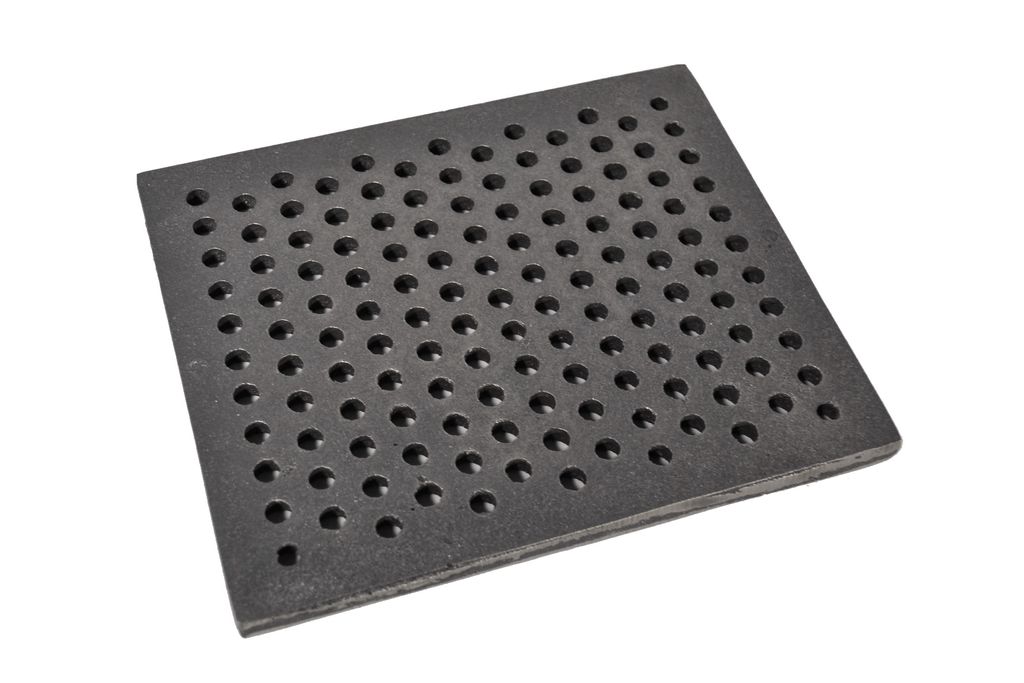 A square cast iron grate with many small holes, shown at an angle on a white background.