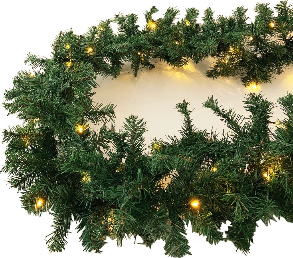 A close-up view of a green Christmas garland with small LED lights.