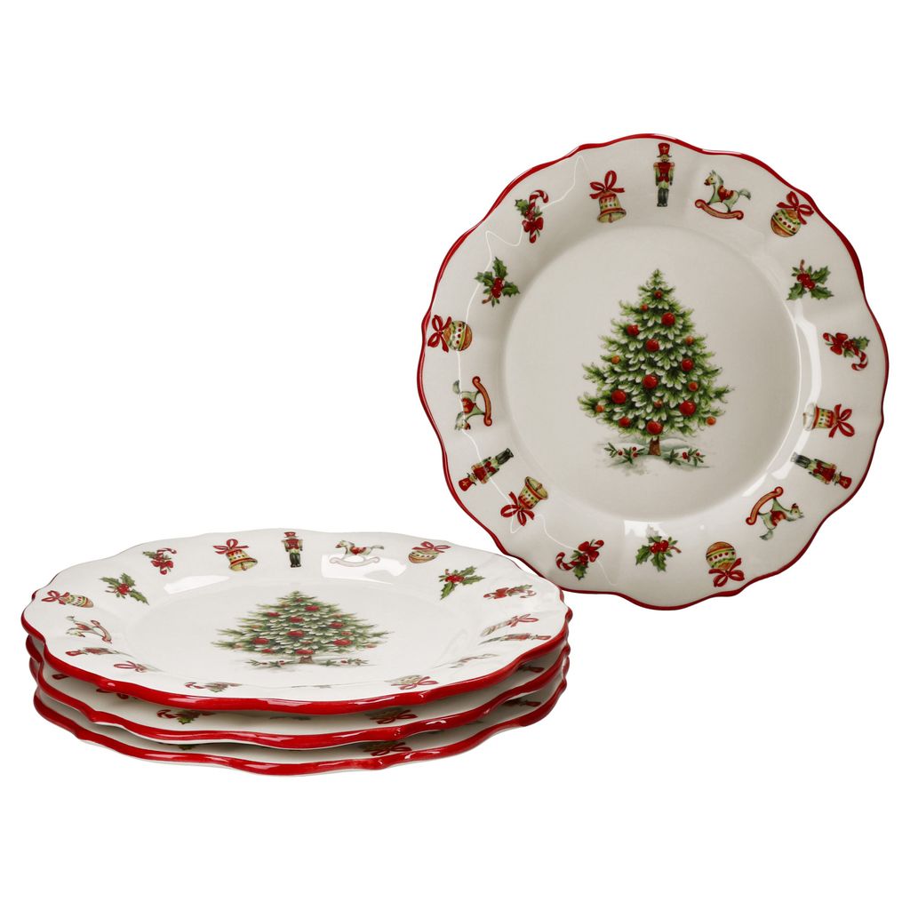 A stack of four Christmas-themed plates with a red scalloped edge and a Christmas tree in the center, surrounded by various Christmas ornaments and figures.