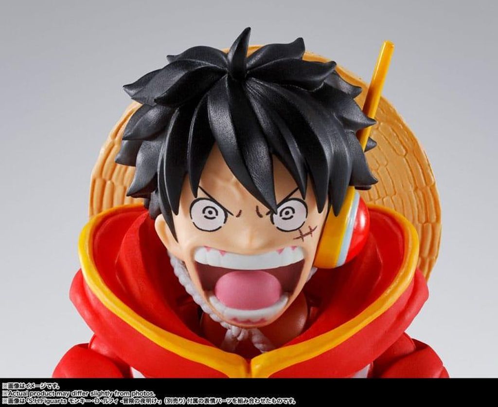 Close-up of an anime action figure's head and shoulders.