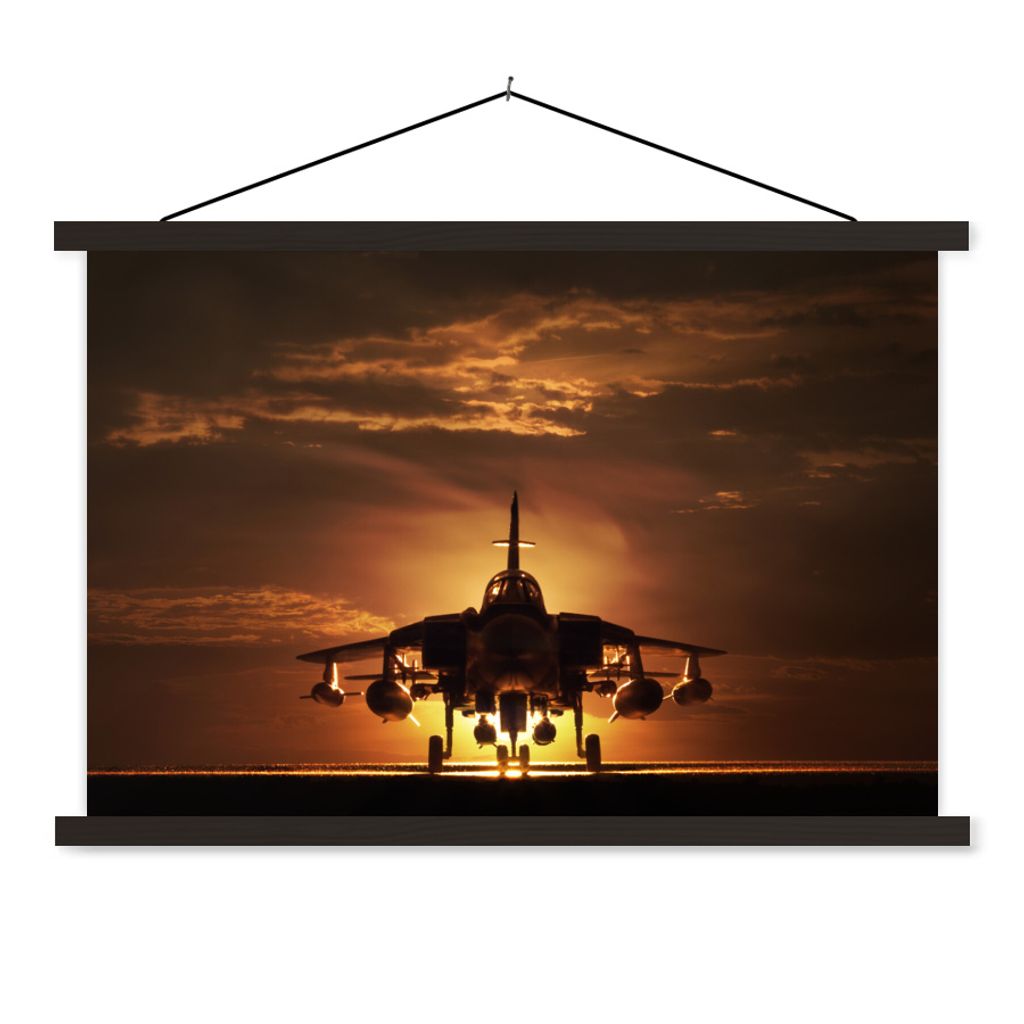 MuchoWow Textilposter Die Silhouette eines Kampfjets bei Sonnenuntergang 60x40 cm mit schwarzem Rahmen - Hölzernes