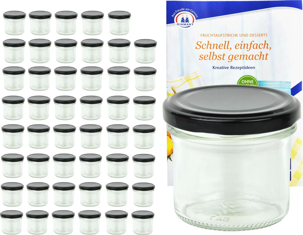 A set of small glass jars with black lids, arranged in rows, next to a product box and a single jar.