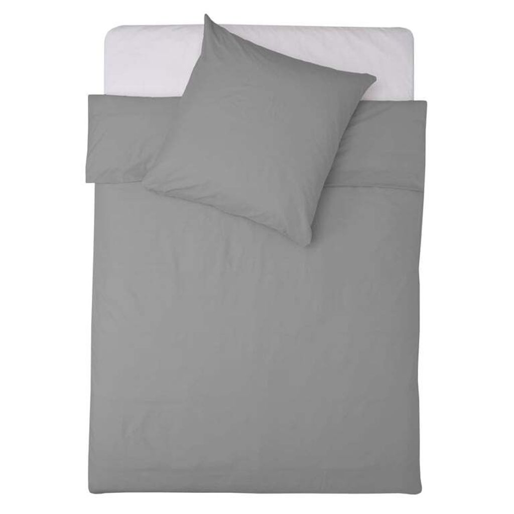 A top-down view of a grey duvet cover and pillowcase set laid out on a white surface.