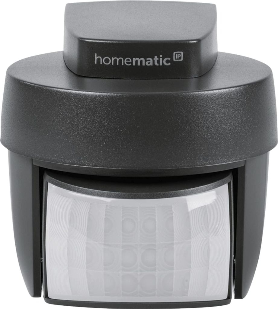 A dark gray Homematic IP motion detector with a clear Fresnel lens is shown against a white background.