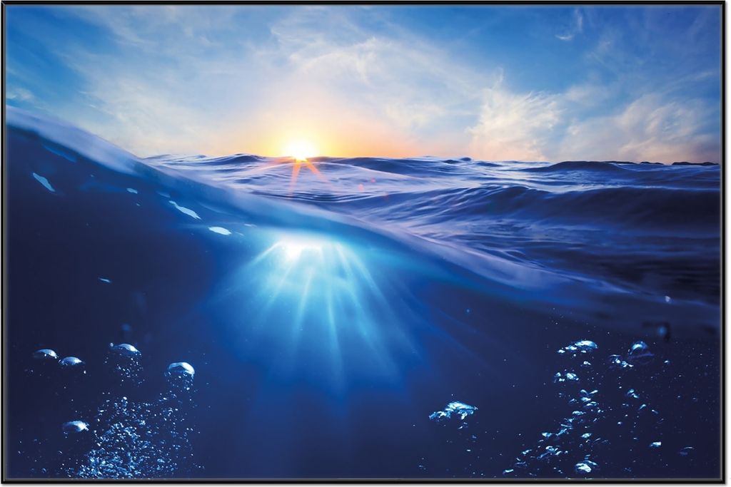 Wallario Wandbild Wellen im Meer bei Sonnenuntergang, Größe: 61 x 91,50 cm, Poster mit schwarzem Aluminiumrahmen