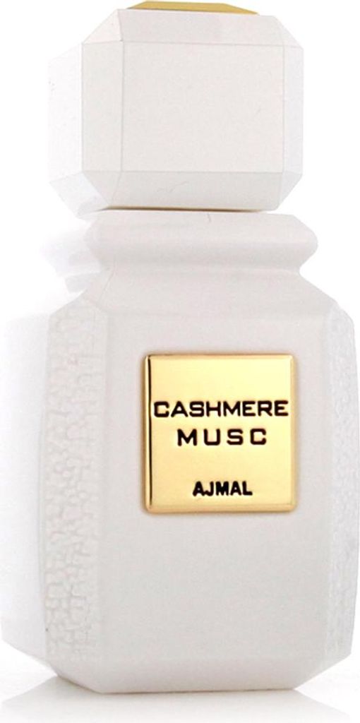 A white perfume bottle with a gold label.
