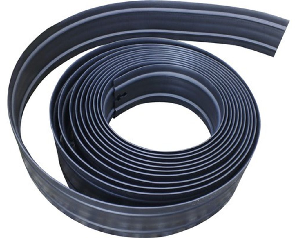 A coiled roll of black plastic edging with gray stripes.
