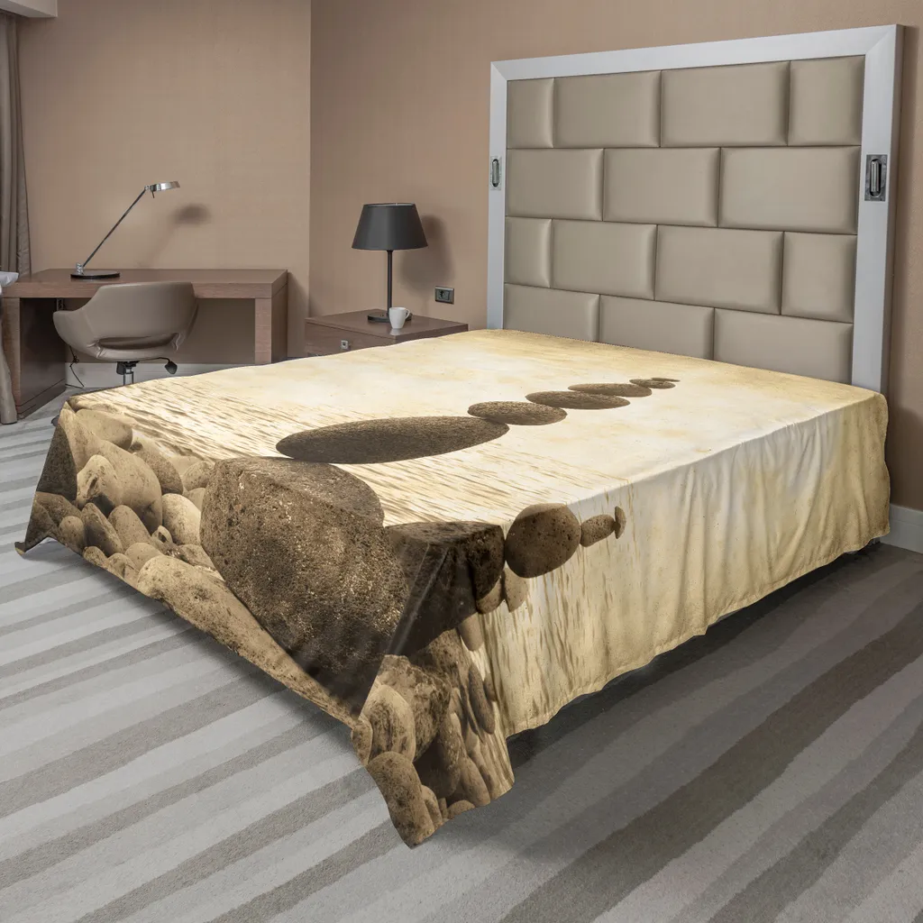 Linge de lit décoratif imprimé Zen avec motif galets et océan sépia
