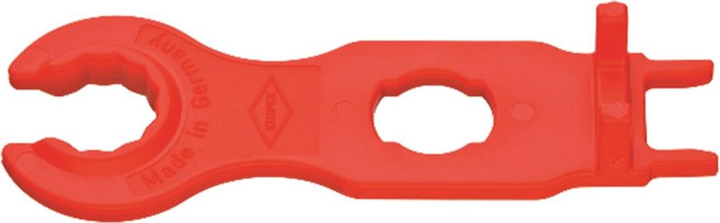 A red plastic tool on a white background.