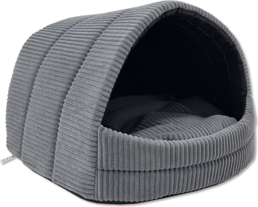 A gray corduroy pet bed shaped like a dome with an opening.