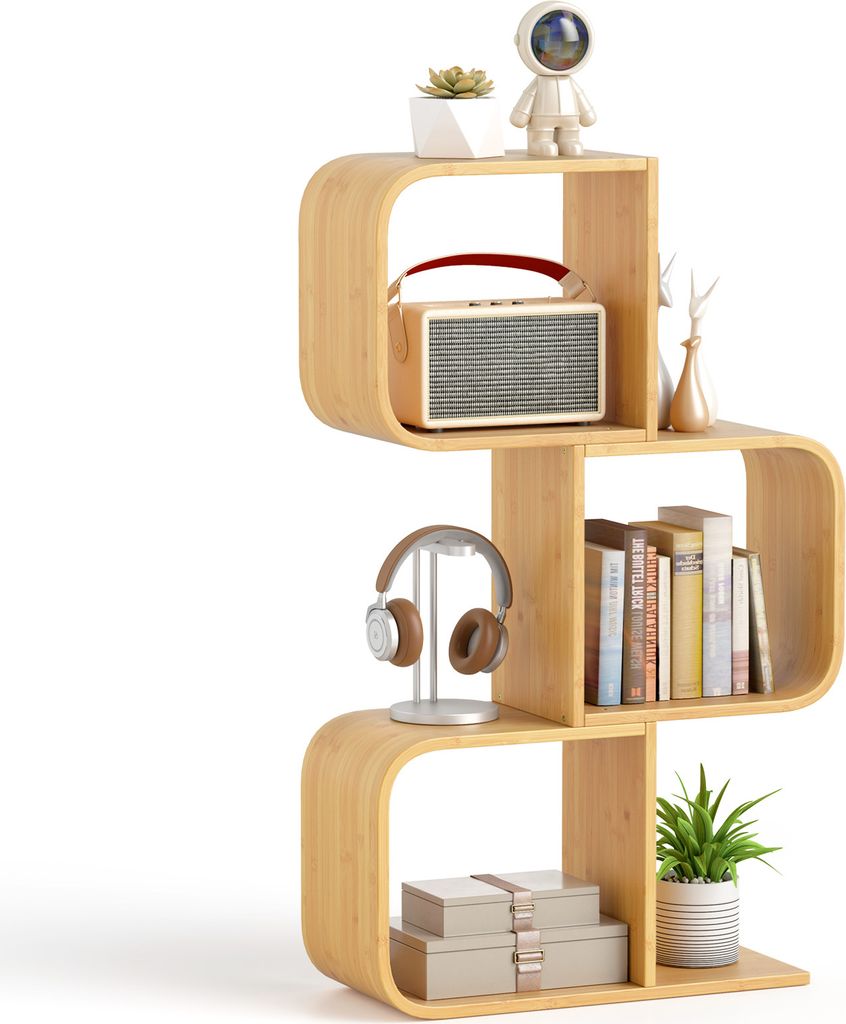 A S-shaped bookshelf with various items on it, including a radio, books, headphones, a plant, and decorative items.