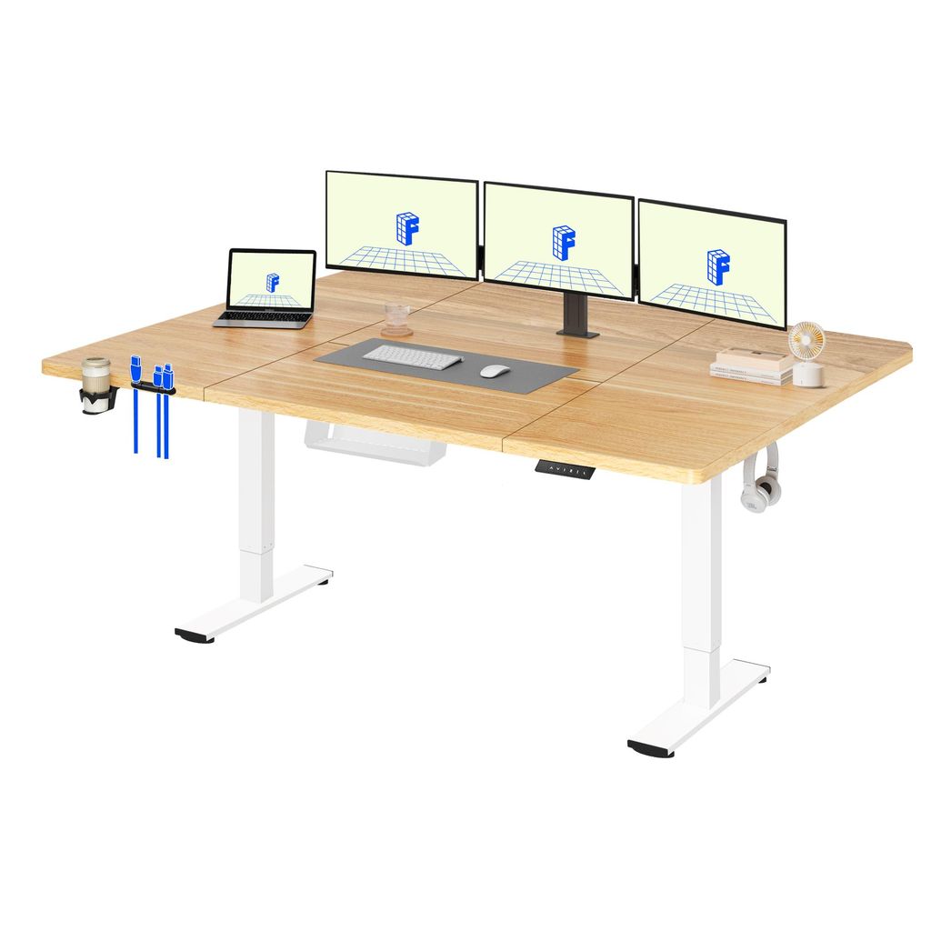 A clean studio shot of an adjustable standing desk with multiple monitors, a laptop, and accessories.