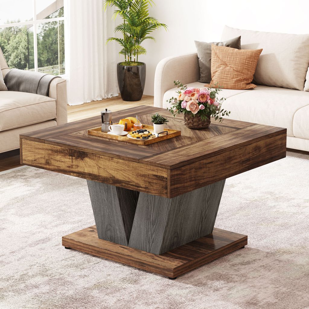 A modern living room setting with a coffee table.