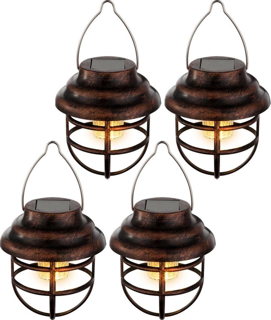 Four solar-powered lanterns arranged in a grid.