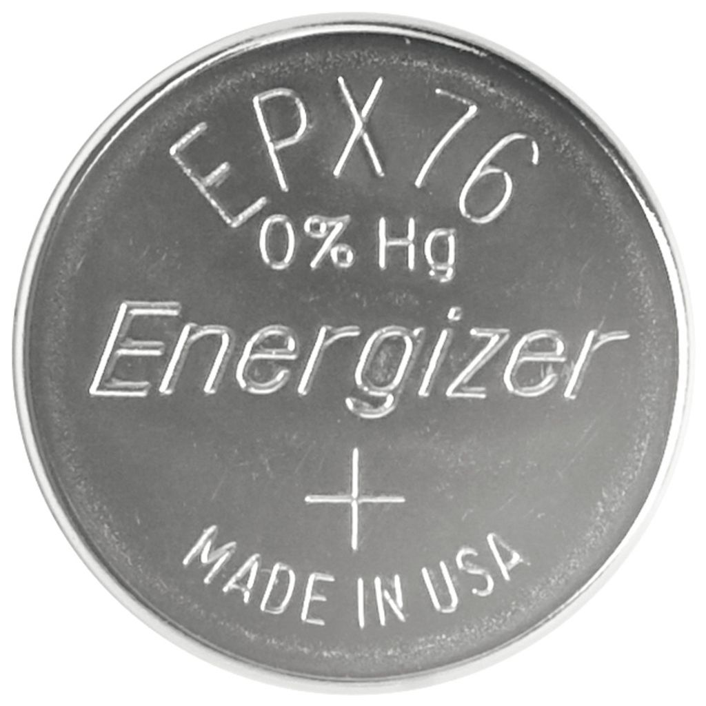 A close-up, top-down view of a single silver coin-shaped battery.