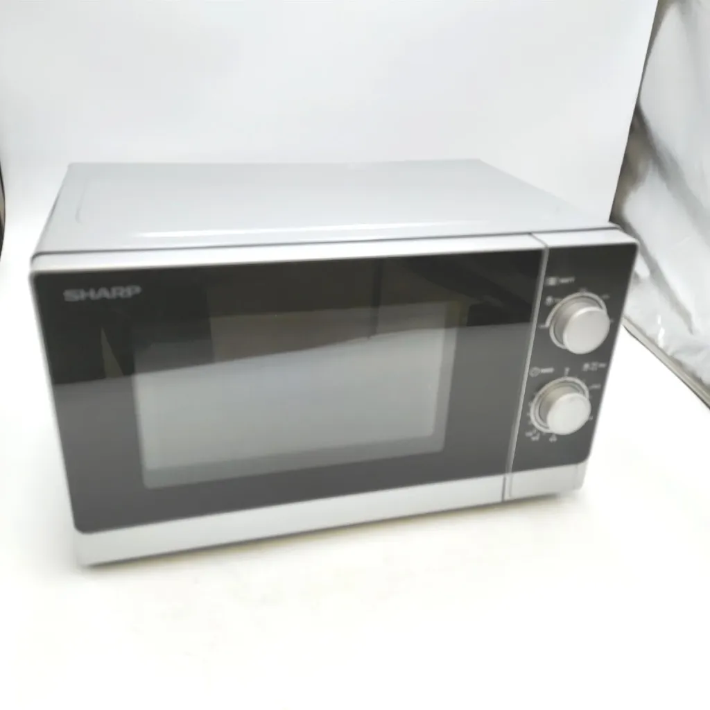 Four à micro-ondes idéal pour repas rapides et décongélation inox - 18
