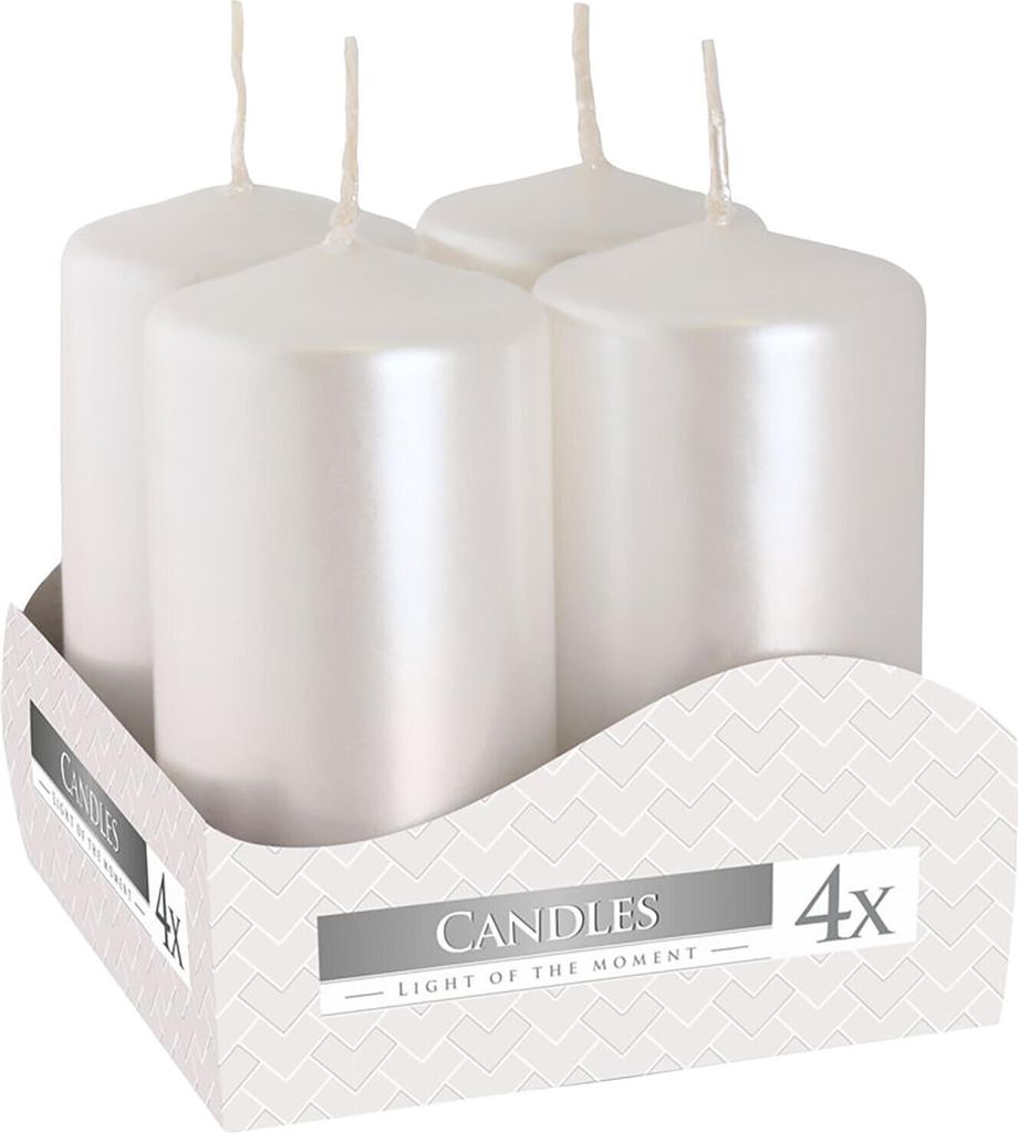 Four white pillar candles in a cardboard display box.